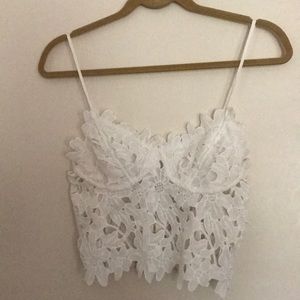 White floral polyester top.